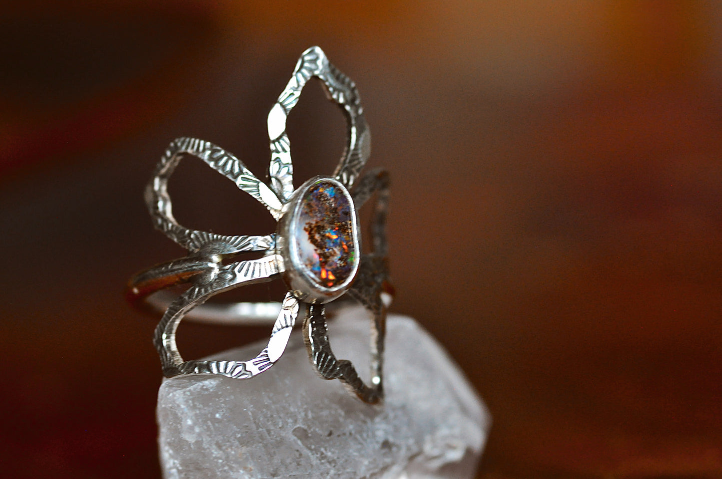 Silver flower ring with a australian opal stone