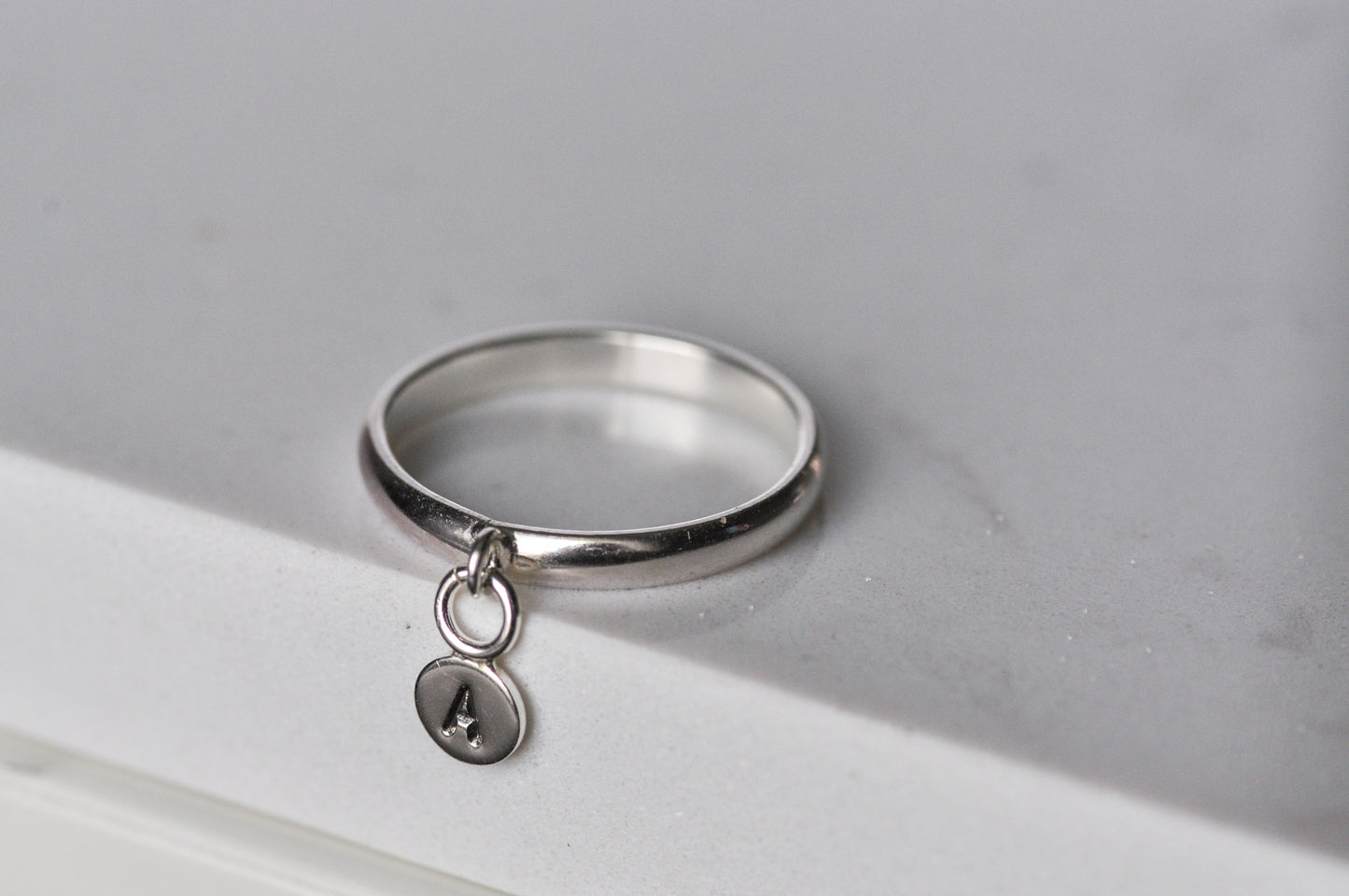 Initial Charm Ring