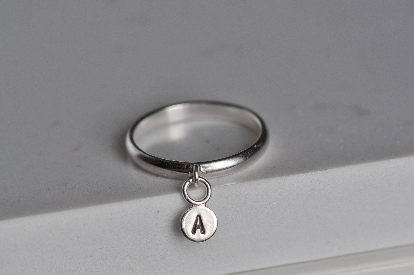 Initial Charm Ring