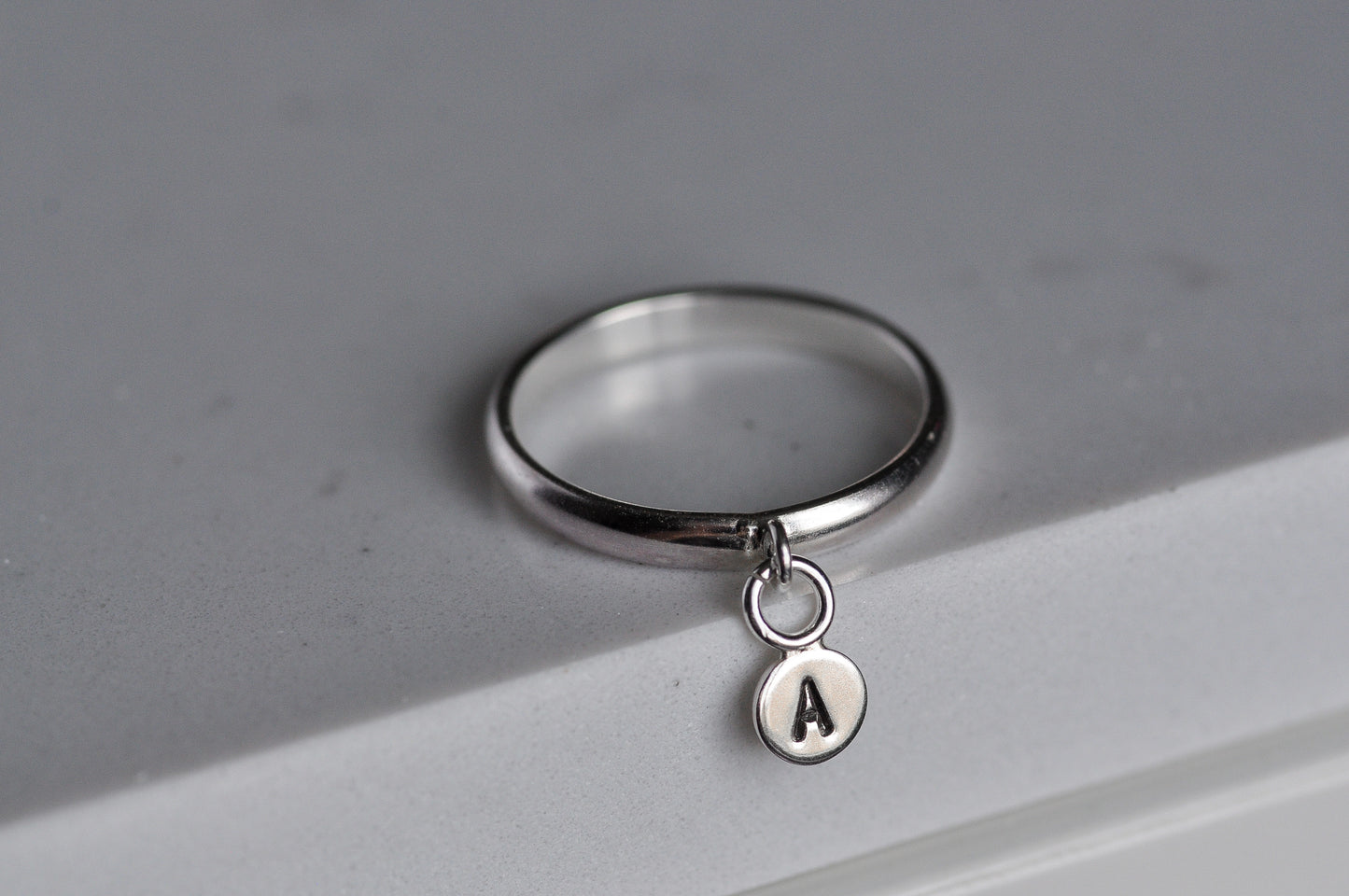 Initial Charm Ring