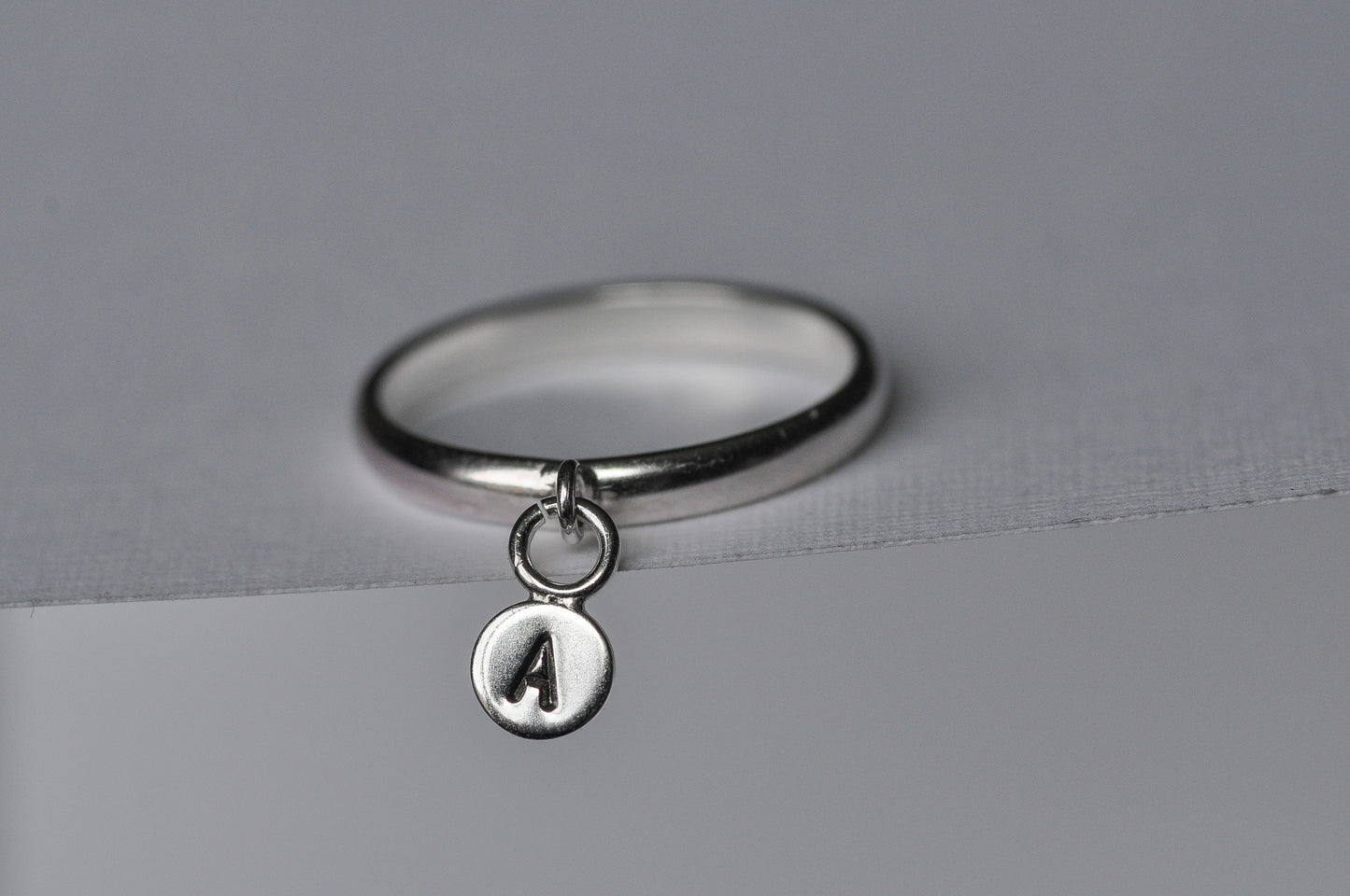 Initial Charm Ring