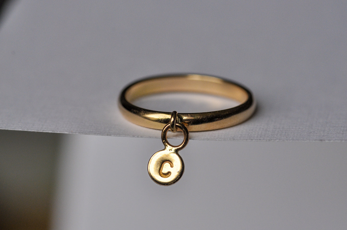 Initial Charm Ring